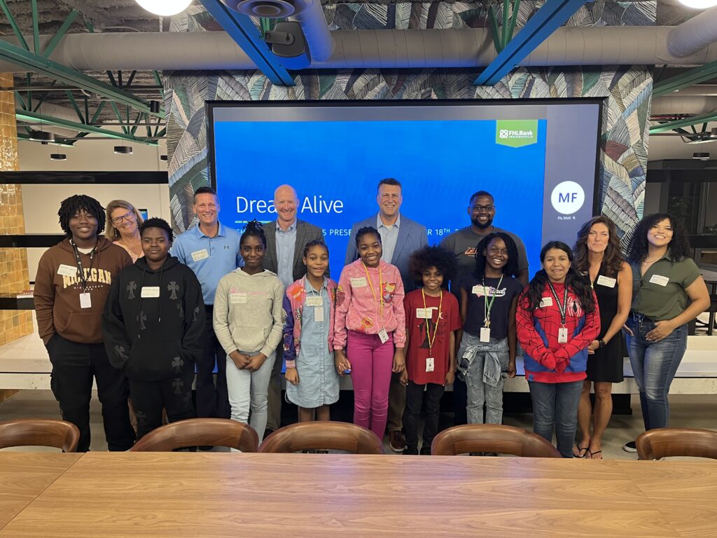 Students and staff at FHL Bank